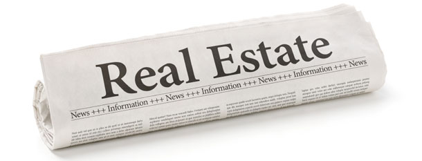 Bild einer Zeitung mit Marktberichten und Statistiken von Immobilien in Cape Coral Florida