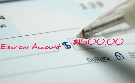 Picture of an escrow deposit check being filled in